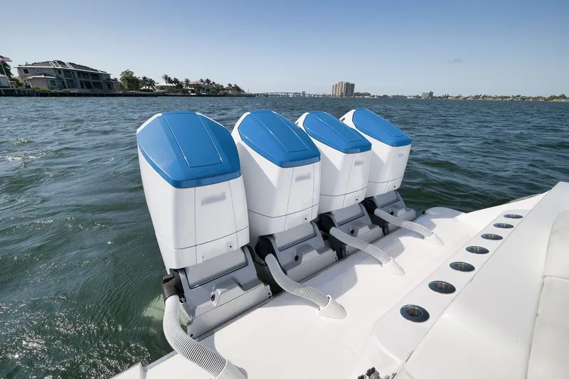 Slide: The Image of HCB 53 Suenos 2023 with four outboard engines on the water. - 45