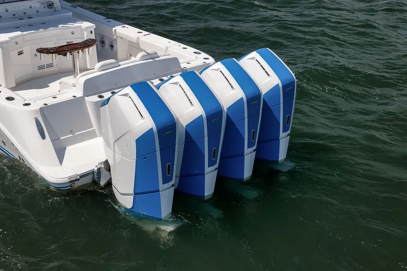 Slide: The Image of 2023 HCB 53 Suenos with four outboard engines on the water. - 6