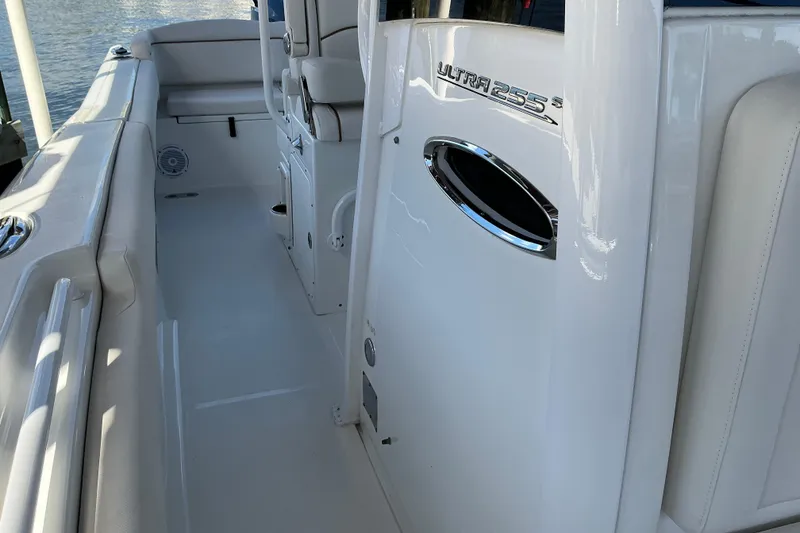 Slide: The Image of 2019 Sea Hunt Ultra 255 SE boat interior with seating and sleek design. - 43