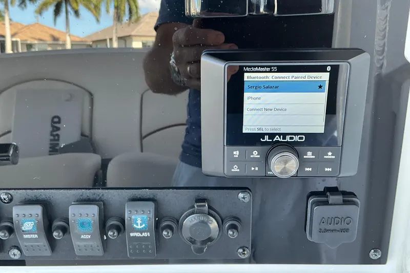 Slide: The Image of Control panel of a 2019 Sea Hunt Ultra 255 SE boat with JL Audio system. - 45