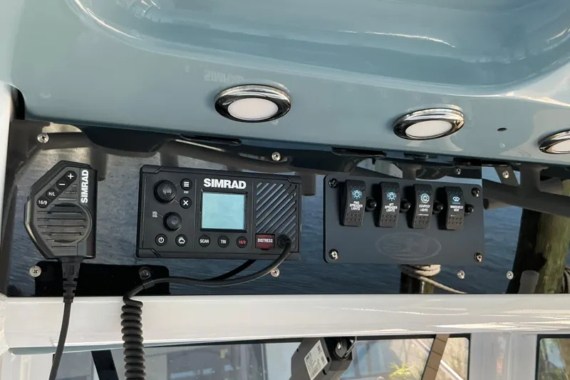 Slide: The Image of Control panel of a 2019 Sea Hunt Ultra 255 SE boat with Simrad electronics. - 47