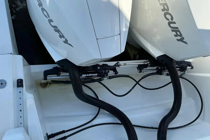Slide: The Image of Twin Mercury outboard engines on a 2022 Beneteau Antares 9 boat. - 28