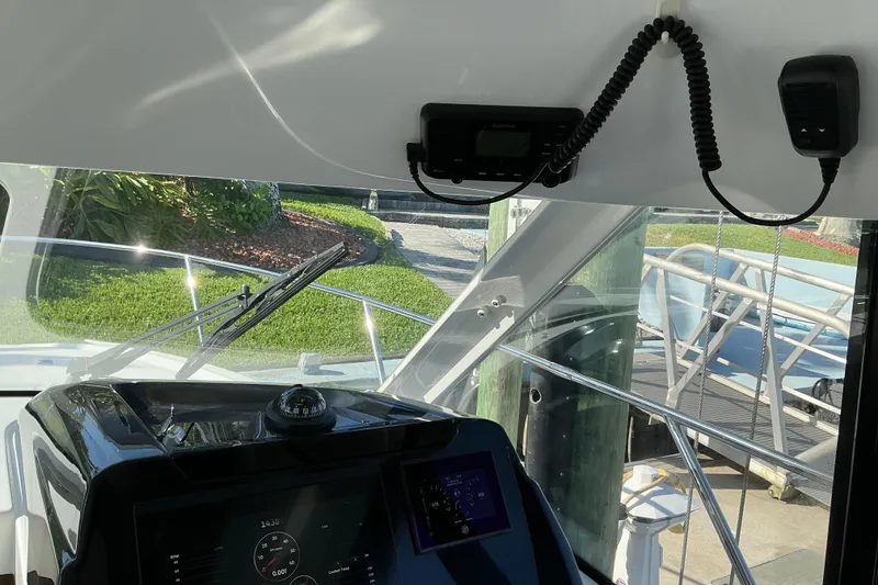 Slide: The Image of Interior view of 2022 Beneteau Antares 9 boat cockpit with navigation equipment. - 32