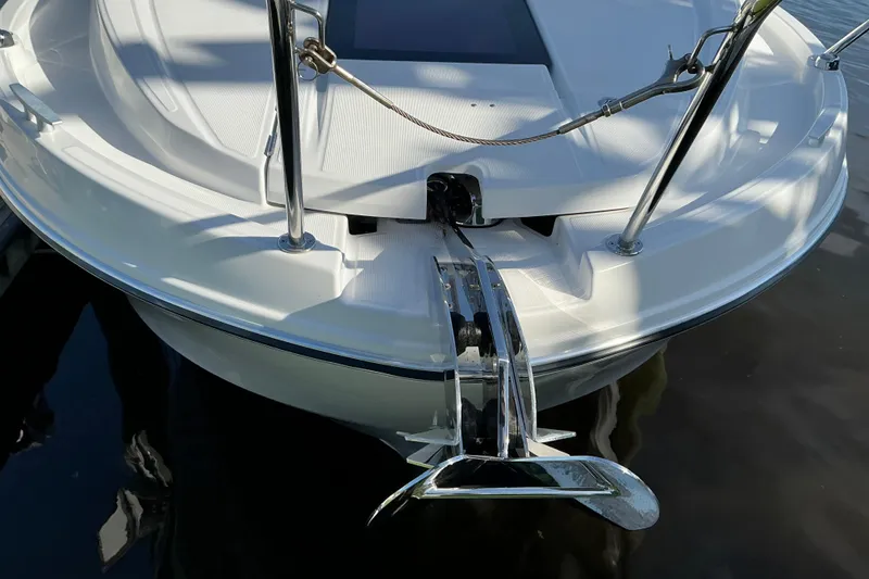 Slide: The Image of Bow of 2022 Beneteau Antares 9 with anchor and railing in sunlight. - 4