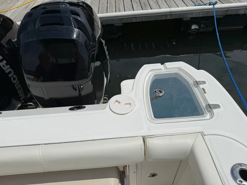 Slide: The Image of Boston Whaler 285 Conquest 2016 with Mercury engines at dock. - 10