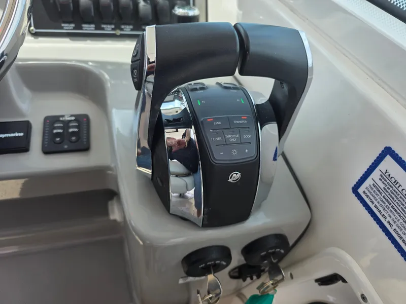 Slide: The Image of Control console of the 2016 Boston Whaler 285 Conquest. - 27