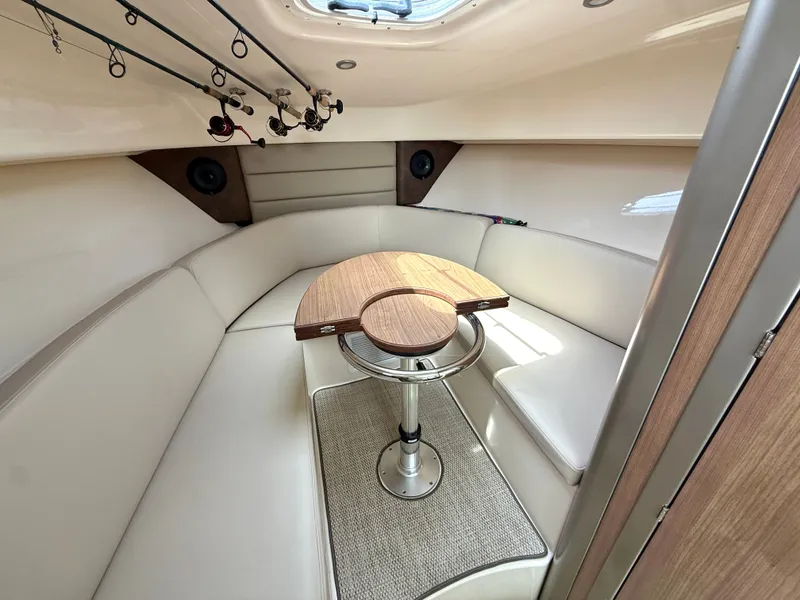 Slide: The Image of Interior of 2016 Boston Whaler 285 Conquest with seating and table. - 33