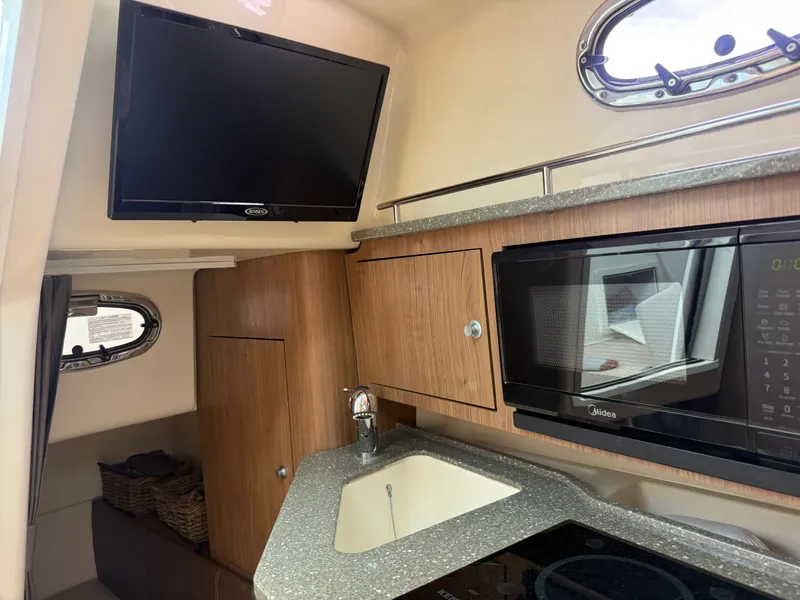 Slide: The Image of Interior of 2016 Boston Whaler 285 Conquest with TV and microwave. - 37
