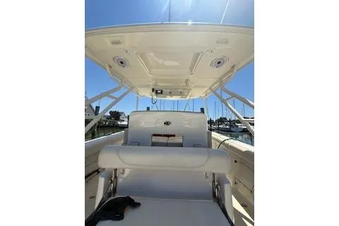 Slide: The Image of 2014 Pursuit S 280 Sport boat interior with seating and overhead view. - 7