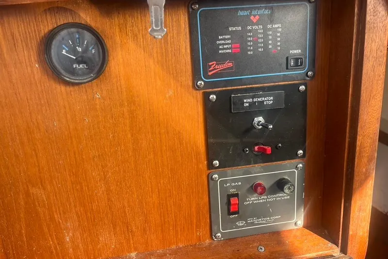 Slide: The Image of Control panel of a 1971 Santana 37 sailboat with fuel gauge and switches. - 20