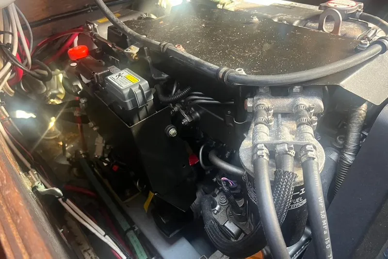 Slide: The Image of Engine compartment of a 1971 Santana 37, showcasing detailed mechanical components. - 22