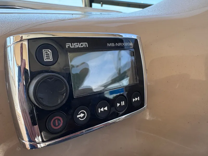 Slide: The Image of Fusion MS-NRX200 control panel on 1999 Sea Ray 38 Sundancer. - 15