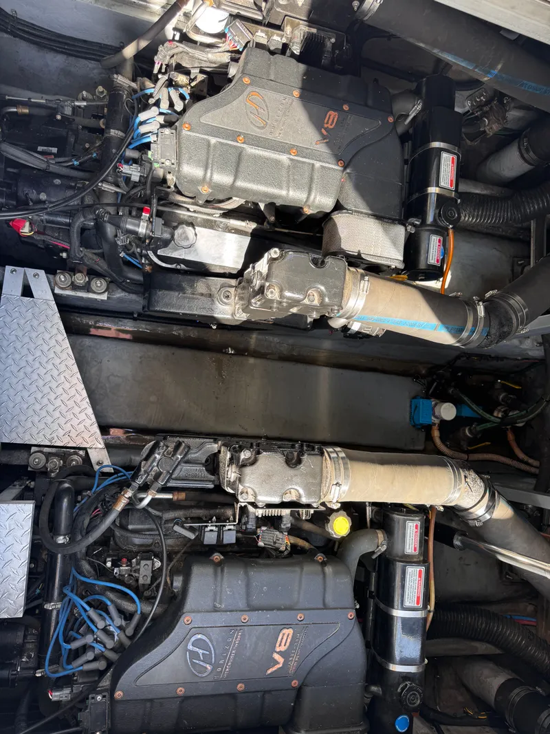 Slide: The Image of Engine compartment of a 1999 Sea Ray 38 Sundancer boat. - 23