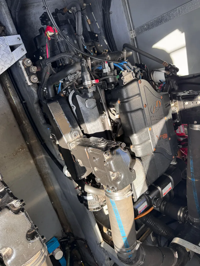 Slide: The Image of Engine compartment of a 1999 Sea Ray 38 Sundancer boat. - 24