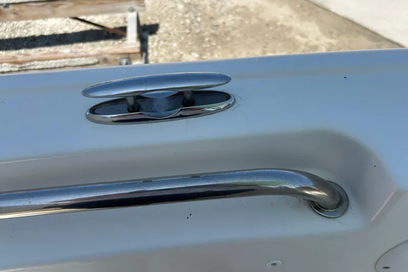 Slide: The Image of Chrome cleat on 2016 Tidewater 210 LXF boat deck, close-up view. - 33
