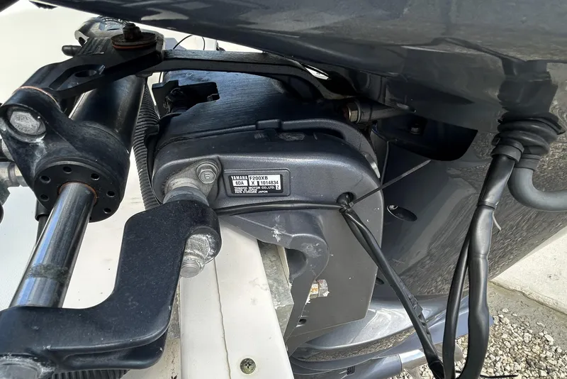 Slide: The Image of Close-up of a 2016 Tidewater 210 LXF boat engine component. - 34