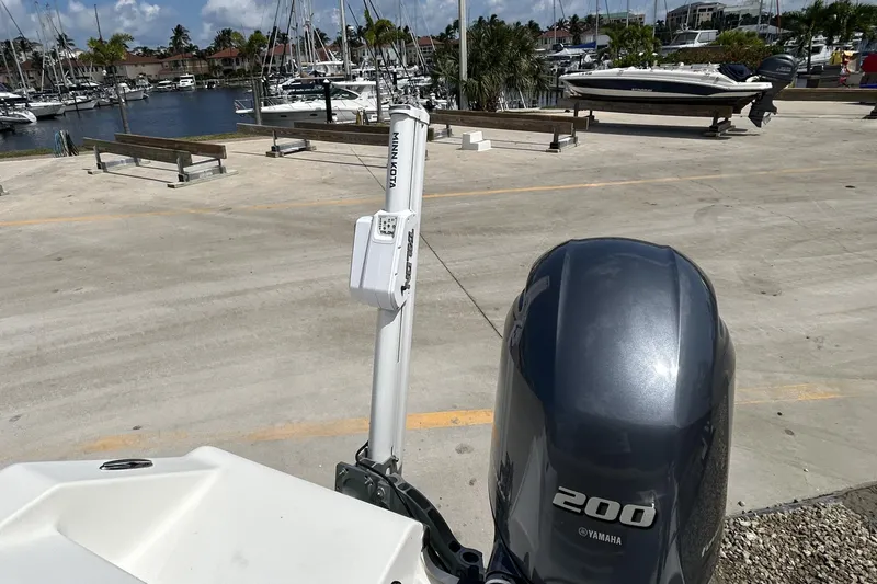 Slide: The Image of Tidewater 210 LXF boat with Yamaha 200 engine at marina, 2016 model. - 5
