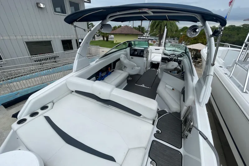 Slide: The Image of 2022 Four Winns HD8 OB boat interior with white seating and modern design. - 32