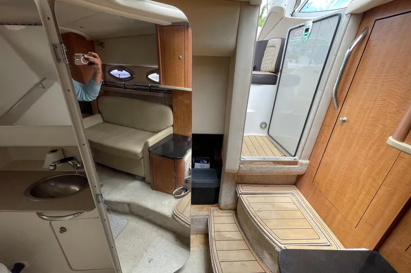 Slide: The Image of Interior of 2006 Sea Ray 290 Sundancer boat, featuring seating, stairs, and wooden cabinetry. - 51