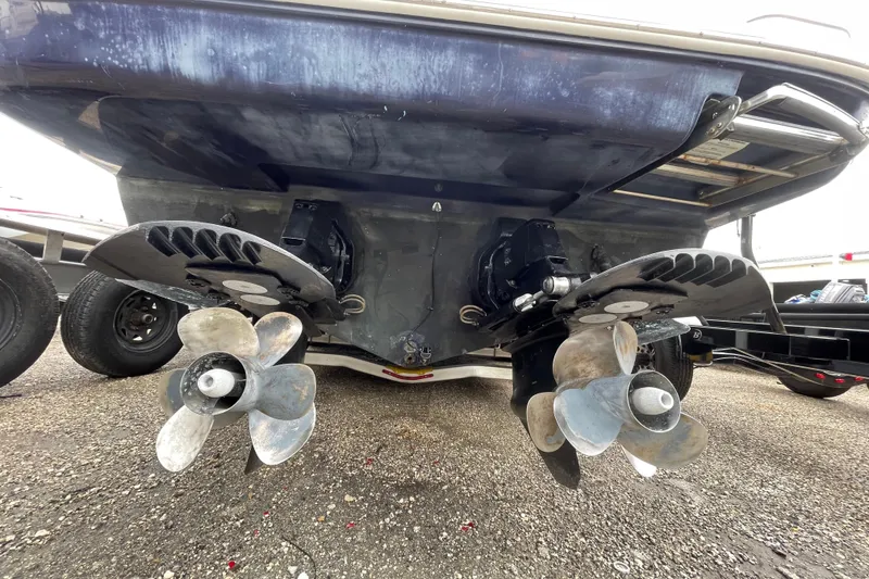 Slide: The Image of 2006 Sea Ray 290 Sundancer boat propellers and stern view on a trailer. - 54