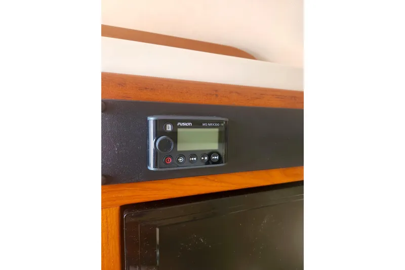 Slide: The Image of Fusion MS-MRX300 stereo system on 2009 Grady-White Express 330 boat interior. - 24