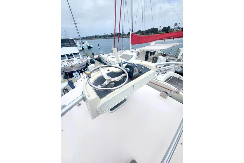 Slide: The Image of Helm of 2009 Grady-White Express 330 boat, docked in a marina. - 3