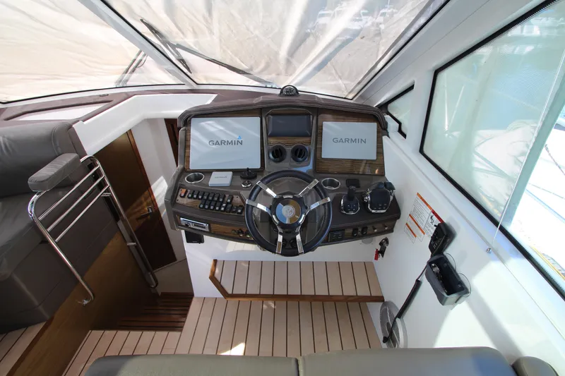 Slide: The Image of Helm of 2014 Cruisers Yachts 45 Cantius with Garmin navigation system. - 23