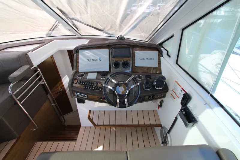 Slide: The Image of Helm of 2014 Cruisers Yachts 45 Cantius with Garmin navigation system. - 24