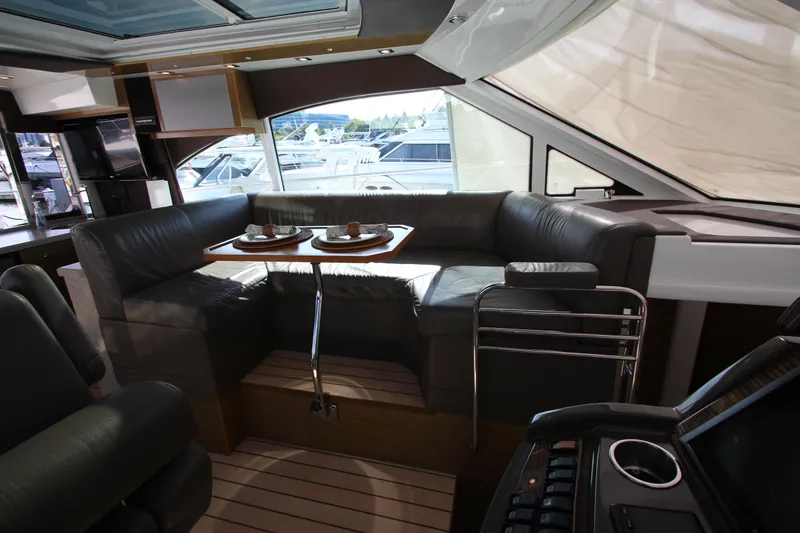 Slide: The Image of Luxurious interior of 2014 Cruisers Yachts 45 Cantius with leather seating and dining area. - 30