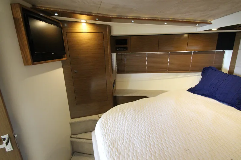 Slide: The Image of Luxurious interior of 2014 Cruisers Yachts 45 Cantius with cozy bed and TV. - 42