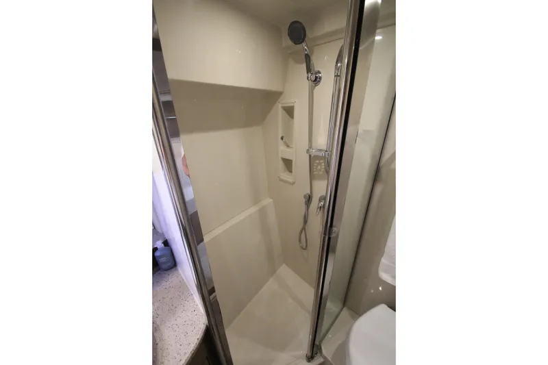 Slide: The Image of Shower area in 2014 Cruisers Yachts 45 Cantius, featuring modern fixtures and sleek design. - 47