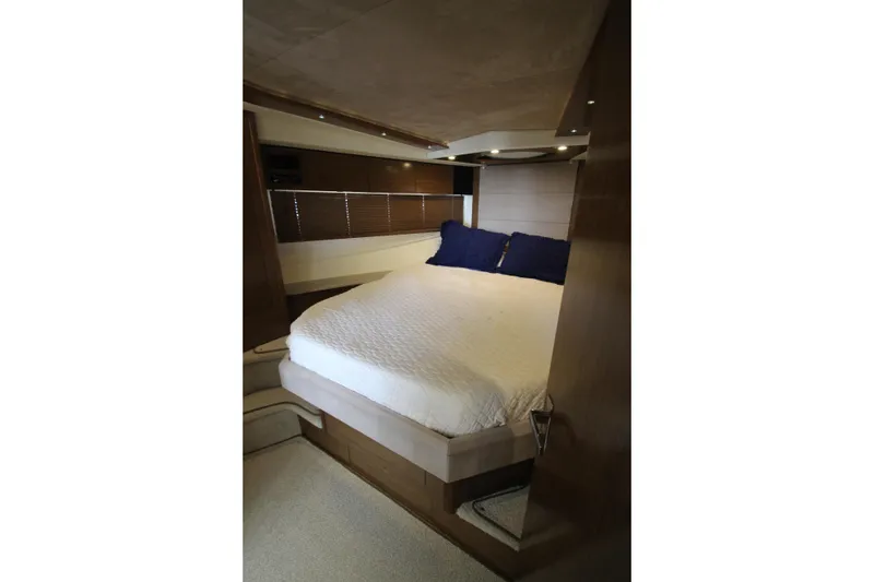 Slide: The Image of Luxurious bedroom interior of 2014 Cruisers Yachts 45 Cantius with cozy bedding. - 49