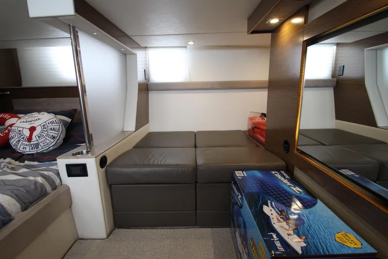 Slide: The Image of Interior of 2014 Cruisers Yachts 45 Cantius, featuring modern seating and decor. - 59