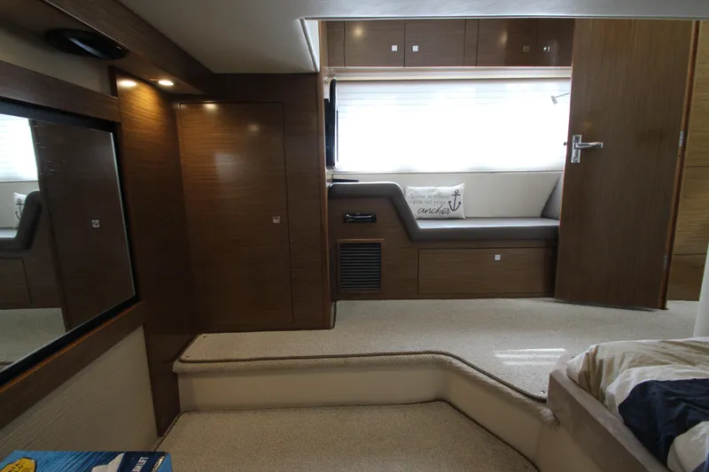 Slide: The Image of Luxurious interior of 2014 Cruisers Yachts 45 Cantius with elegant wood finishes. - 61