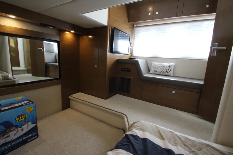 Slide: The Image of Luxurious interior of 2014 Cruisers Yachts 45 Cantius with modern furnishings and natural light. - 65