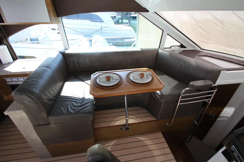 Slide: The Image of Luxurious interior of 2014 Cruisers Yachts 45 Cantius with elegant dining area. - 72