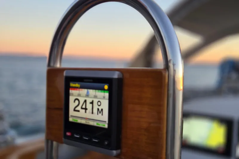 Slide: The Image of Close-up of a navigation display on a 1970 Hinckley Bermuda 40 sailboat at sunset. - 139