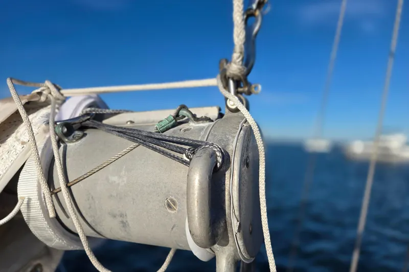 Slide: The Image of Close-up of rigging on a 1970 Hinckley Bermuda 40 sailboat against a blue sky. - 46