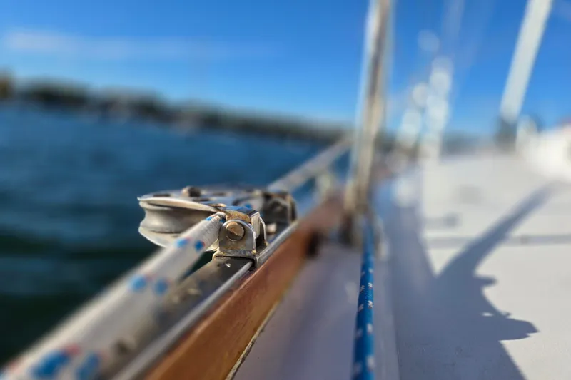 Slide: The Image of Close-up of a 1970 Hinckley Bermuda 40 sailboat deck with rigging details. - 49