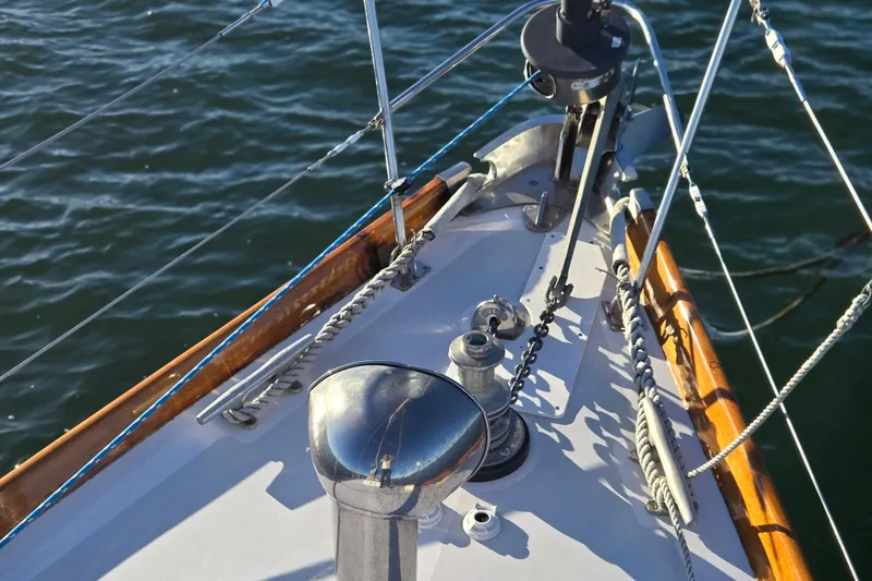Slide: The Image of Bow of a 1970 Hinckley Bermuda 40 sailboat with rigging details. - 53