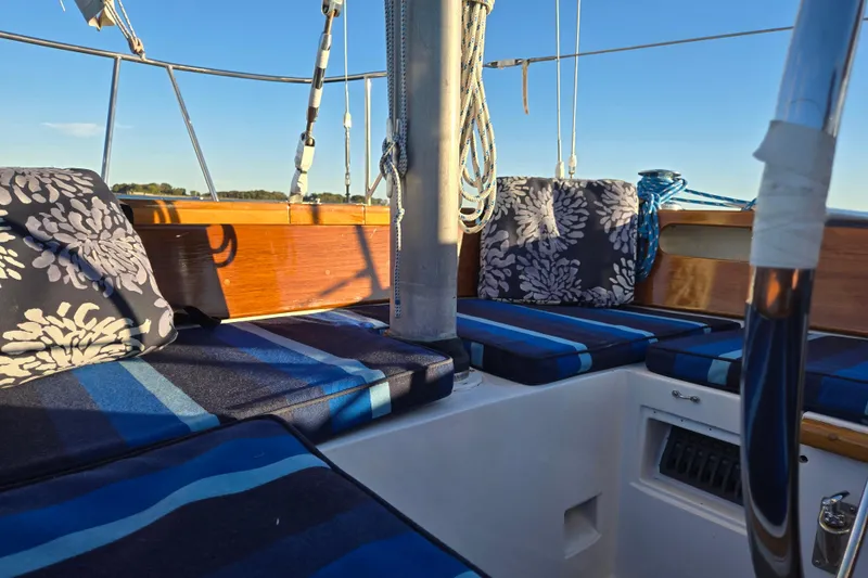 Slide: The Image of Hinckley Bermuda 40 sailboat interior with blue striped cushions, 1970 model. - 75