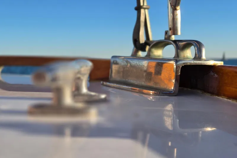 Slide: The Image of Close-up of a 1970 Hinckley Bermuda 40 yacht deck with metal fittings. - 90