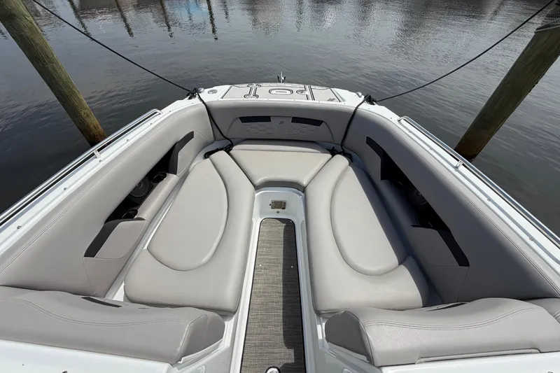 Slide: The Image of 2022 Four Winns HD8 OB boat interior with spacious seating and elegant design. - 20