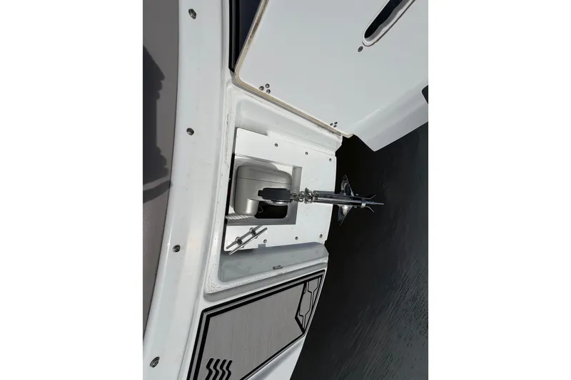 Slide: The Image of 2022 Four Winns HD8 OB boat anchor compartment detail. - 21