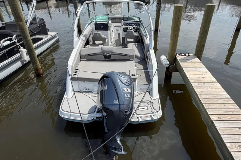 Slide: The Image of 2022 Four Winns HD8 OB boat docked with Yamaha 300 V6 engine. - 6
