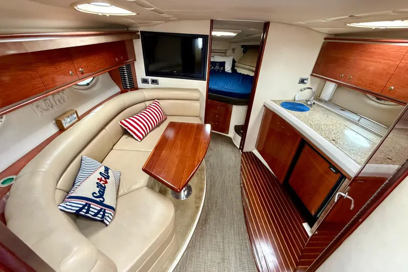 Slide: The Image of Luxurious interior of 2007 Monterey 350 Sport Yacht with cozy seating and modern amenities. - 10