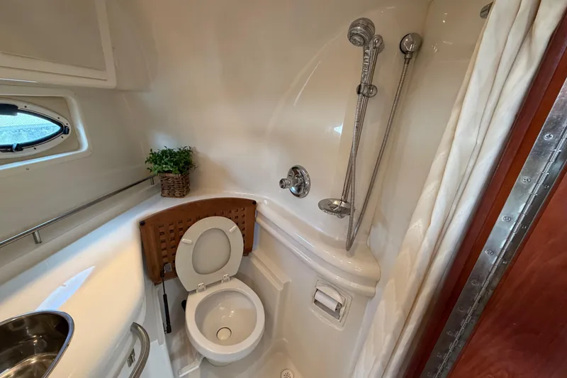 Slide: The Image of Bathroom interior of 2007 Monterey 350 Sport Yacht with shower and toilet. - 25