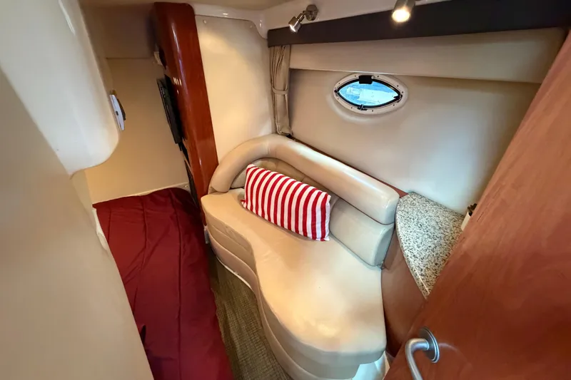 Slide: The Image of Interior of 2007 Monterey 350 Sport Yacht with cozy seating and striped pillow. - 35