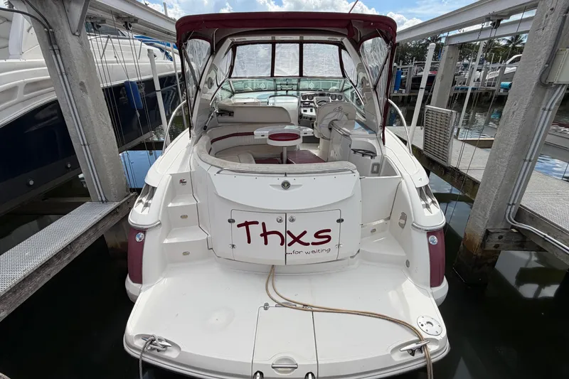 Slide: The Image of 2007 Monterey 350 Sport Yacht docked, featuring spacious seating and "Thxs for waiting" sign. - 4