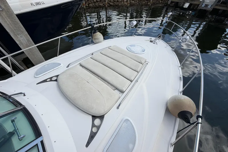 Slide: The Image of 2007 Monterey 350 Sport Yacht docked, featuring spacious sunbathing area and sleek design. - 55
